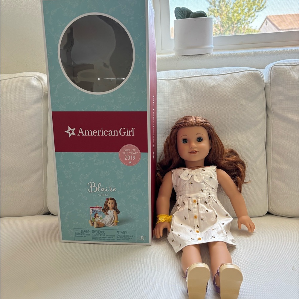 American girl 2019 doll of the year Blair, auburn hair and blue eyes.